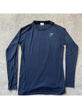 Gymshark Women’s size S Loose Fit Navy Blue Long Sleeve Performance Training Top